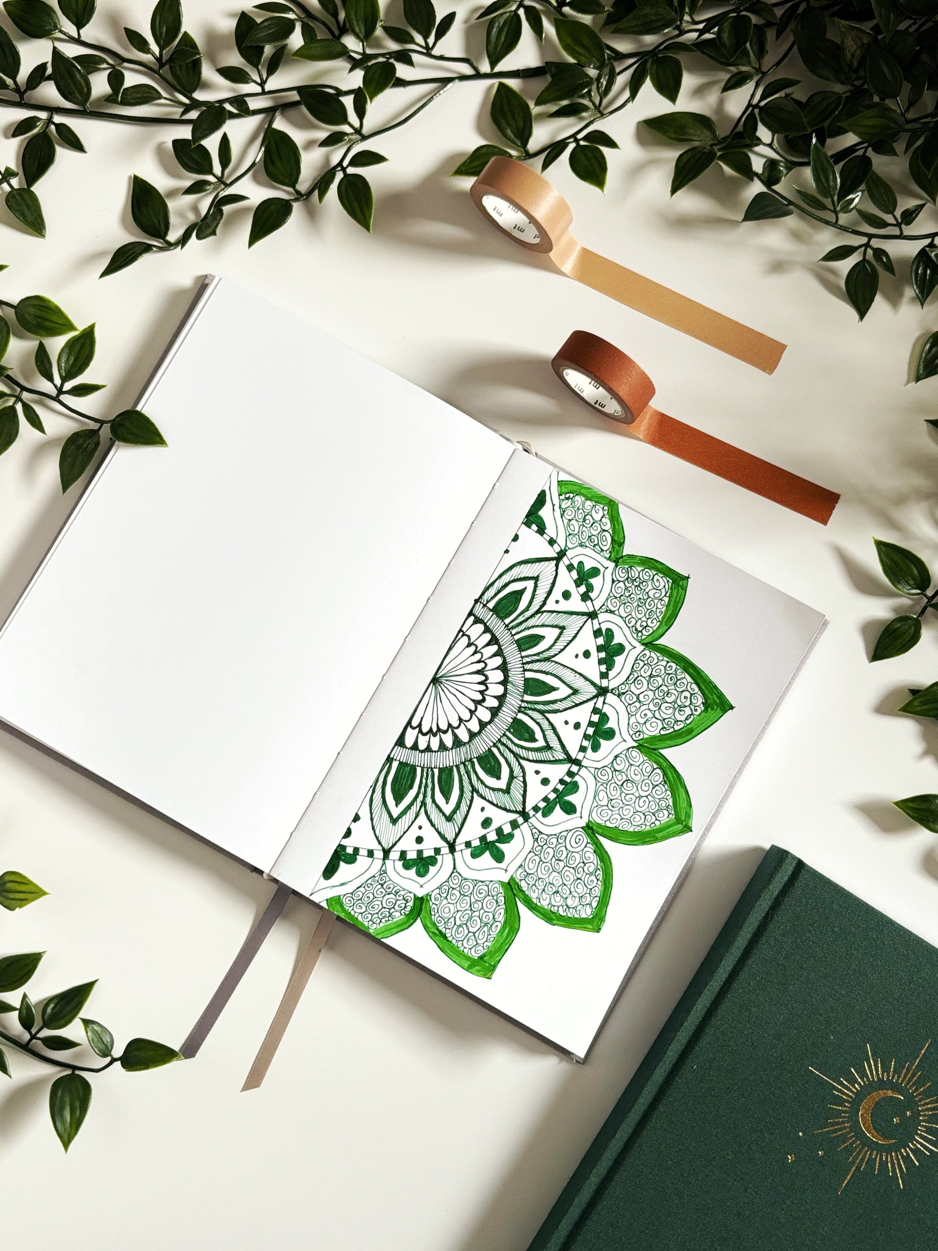 a beautiful mandala art on a planner with Washi tape and Plants